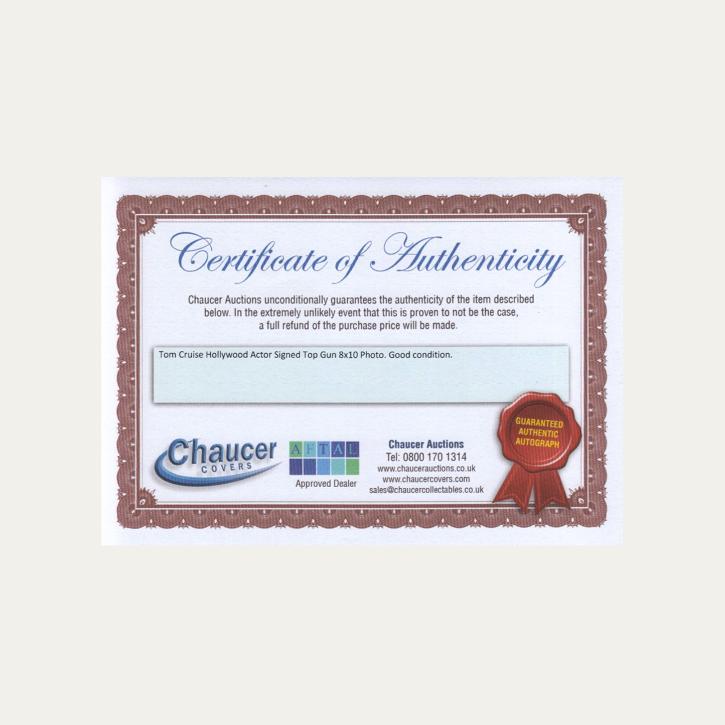 Lote 39: Fotografía firmada de Top Gun (1986) - Tom Cruise y Kelly McGillis